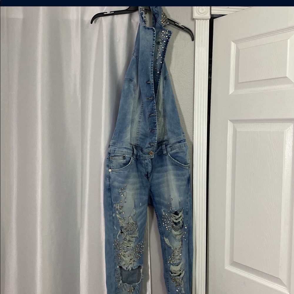Denim jumpsuit 
Size 38 
Only one use